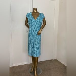 Green dress with white geometric floral print and ruching in size XL